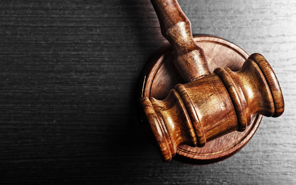 gavel on base representing legal process of suing Walmart